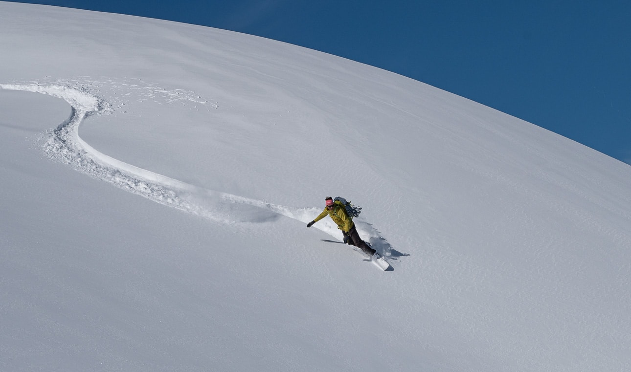 Z6D_2407 a person skiing down a snowy hill